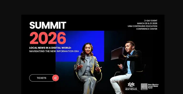 Two speakers sit onstage at a Summit event discussing local news in the digital era.